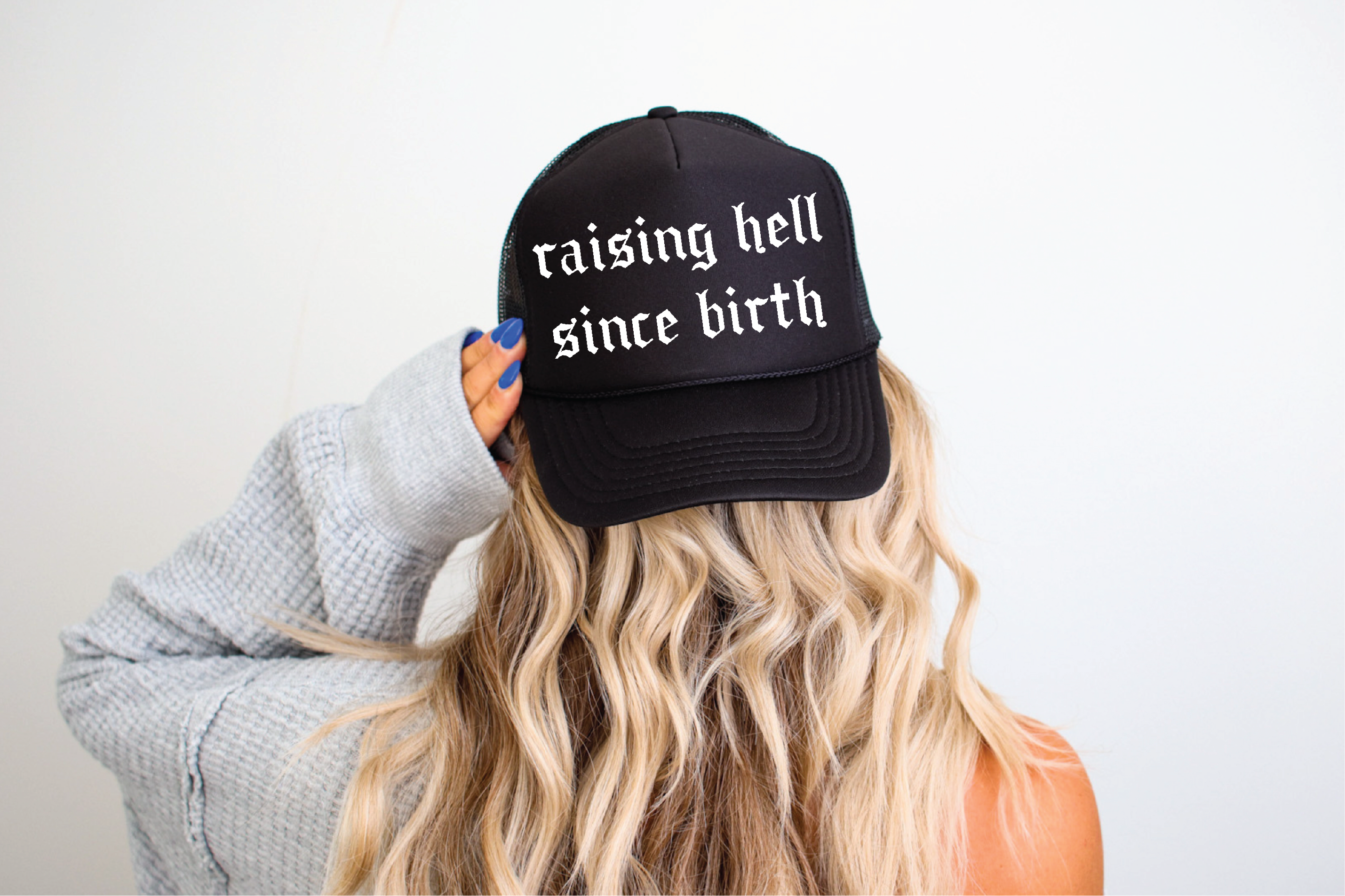 Raising Hell Since Birth DTF Printed Black Trucker Hat